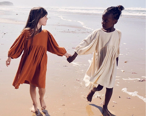 A dreamy, neutral-toned cotton dress for girls, designed with a relaxed fit and elegant draped sleeves for timeless charm and comfort | Dream Nu
