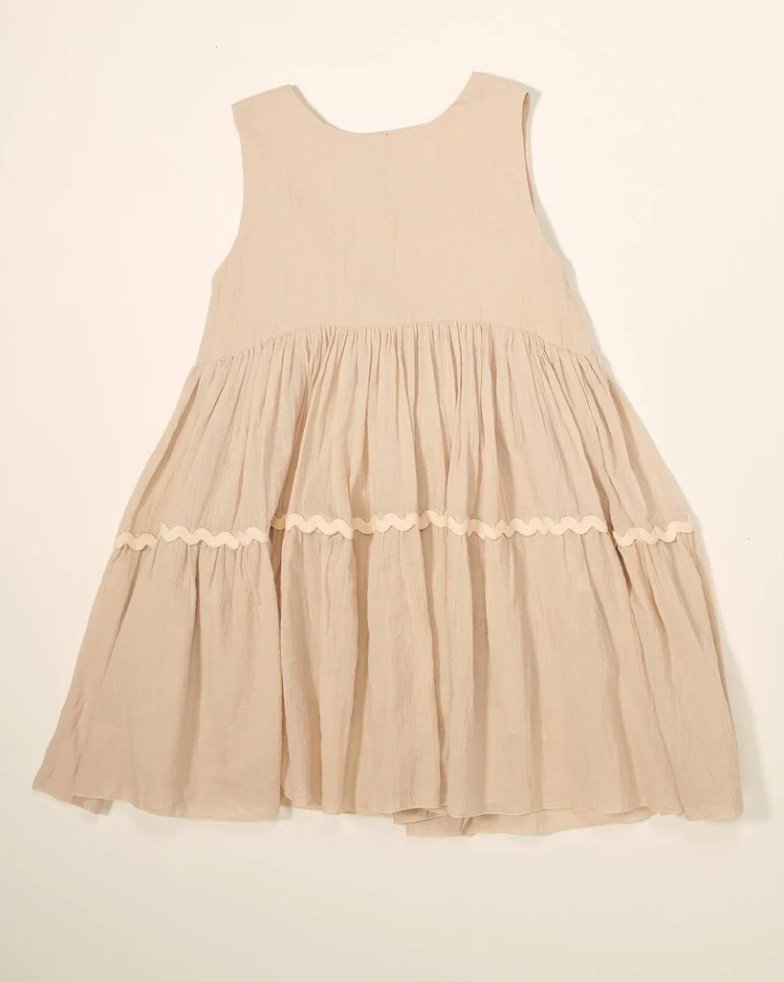 Soft 100% cotton girls dress in beige with playful rick-rack trim and button placket back | Dream Nu