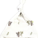 Front view of the newborn organic koala beanie with top-knot.