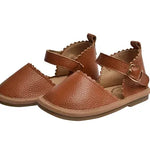 Stylish toddler girl wearing Sweetheart sandals